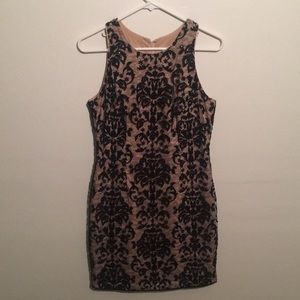 Nude and black cocktail dress